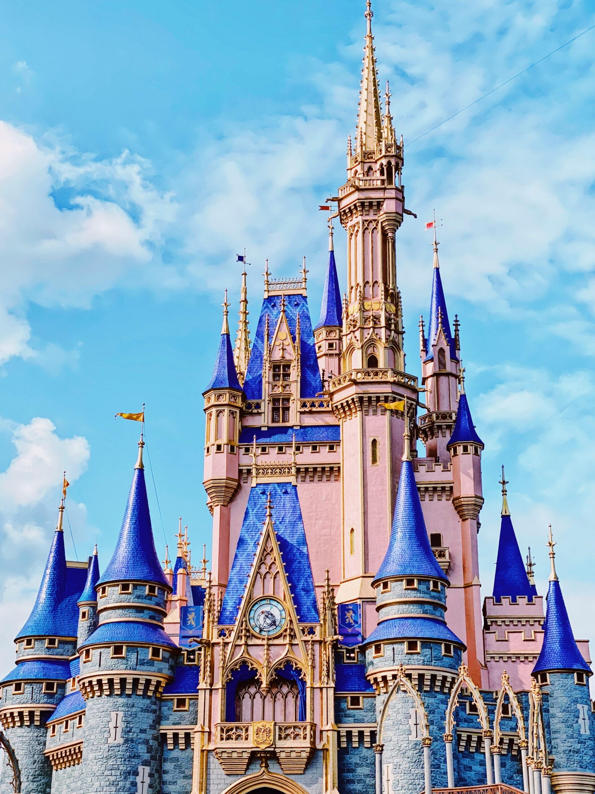 The iconic Cinderella Castle at Magic Kingdom in Orlando captures a magical and fairy tale essence.